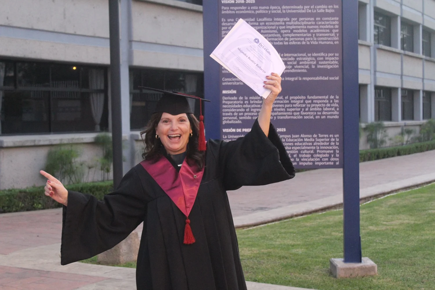 Dr. Raftacco celebrating her DDS degree, part of 20+ years of dental training across four countries